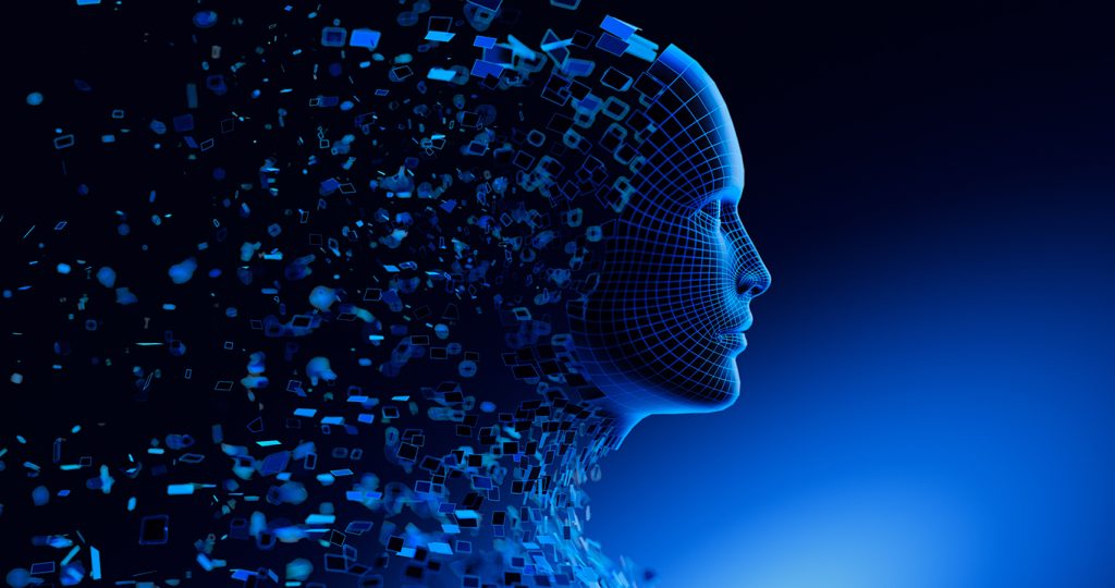 A digital, wireframe human face in profile dissolves into scattered blue data blocks, symbolising artificial intelligence and digital transformation against a dark blue background.