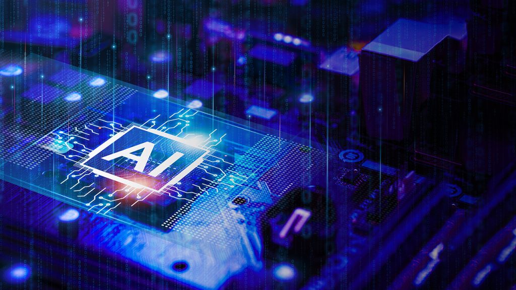 A computer chip on a circuit board glows with the letters "AI" in the centre, surrounded by illuminated digital circuitry. The image has a blue and purple futuristic theme, representing artificial intelligence technology.